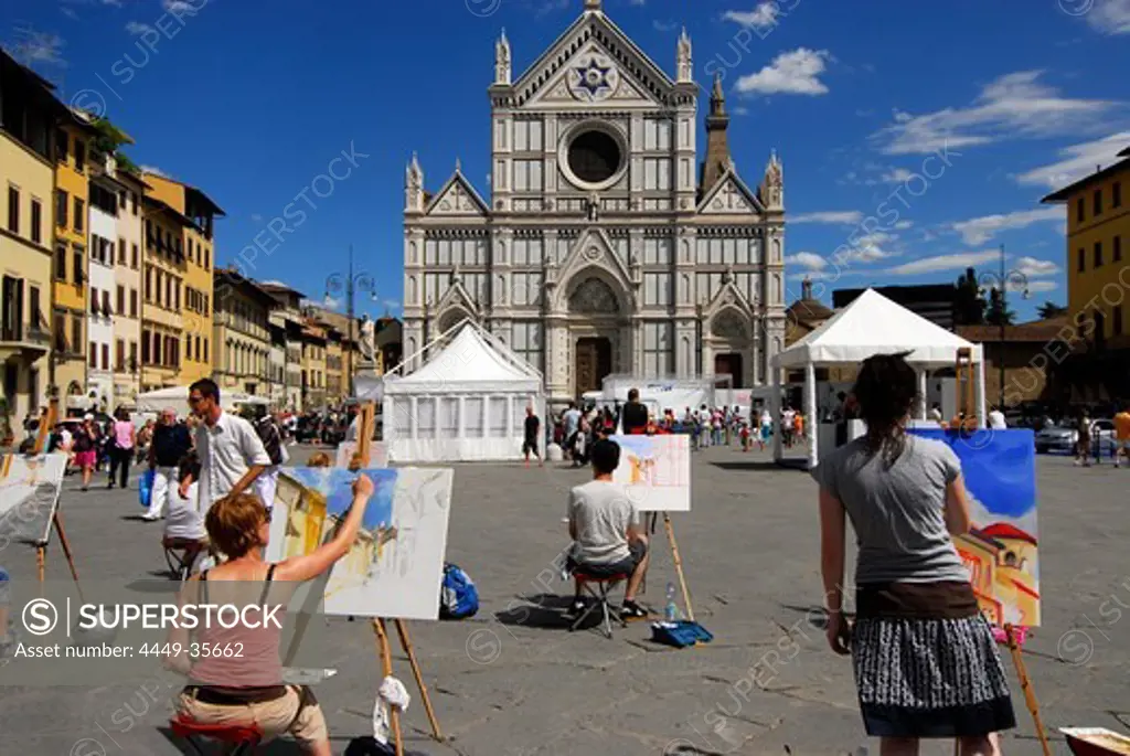 Painting class in front of Santa Croce church under blue sky, Florence, Tuscany, Italy, Europe
