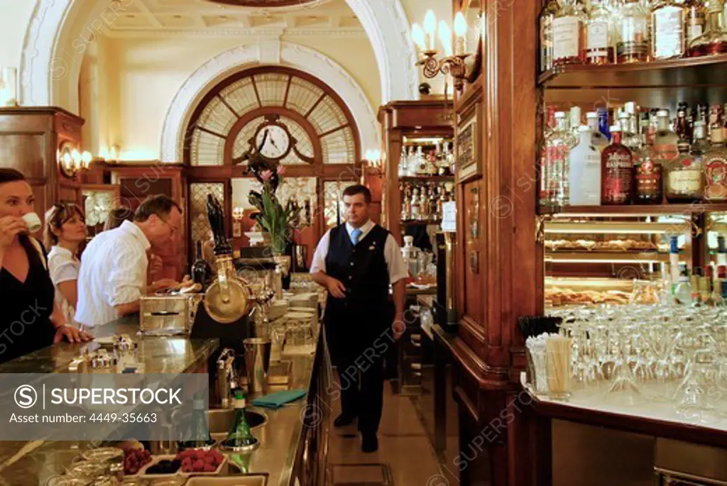 Guests and a waiter at the bar of the Gilli Cafe, Piazza della Republica, Florence, Tuscany, Italy, Europe