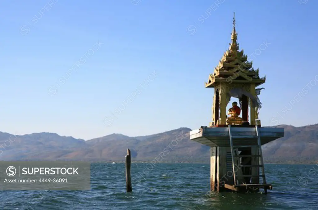 Buddha statue in the middle of the lake in the sunlight, Inle Lake, Shan State, Myanmar, Burma, Asia