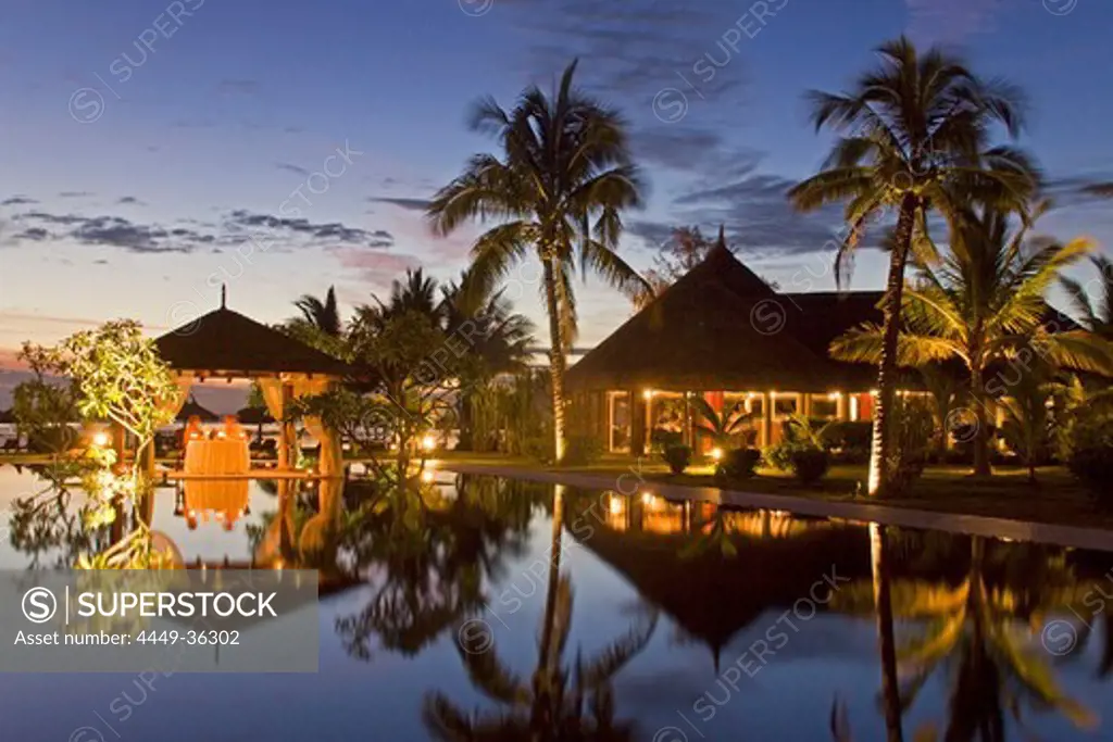Resort Moevenpick at twilight, luxery table in small pavillion, sunset, south coast of Mauritius, Africa