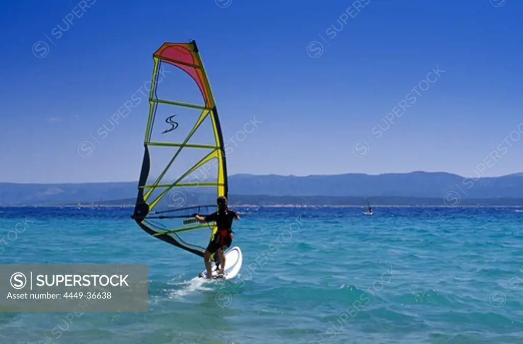 Sail boarder at Golden Horn under blue sky, Brac island, Croatian Adriatic Sea, Dalmatia, Croatia, Europe