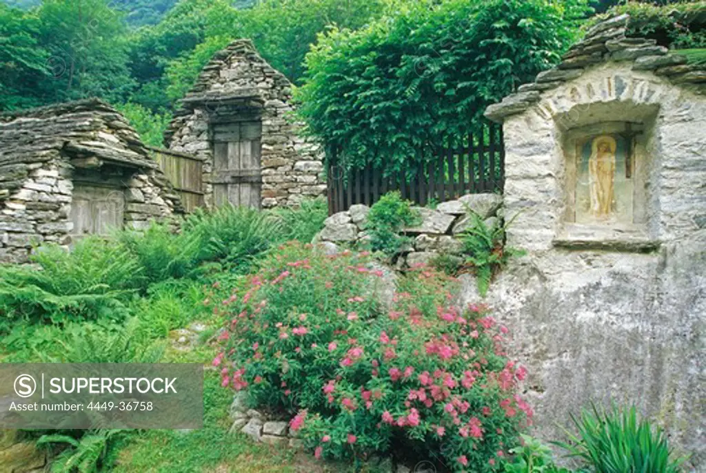 Old stone houses and picture of Virgin Mary, Valle Verzasca, Ticino, Switzerland, Europe
