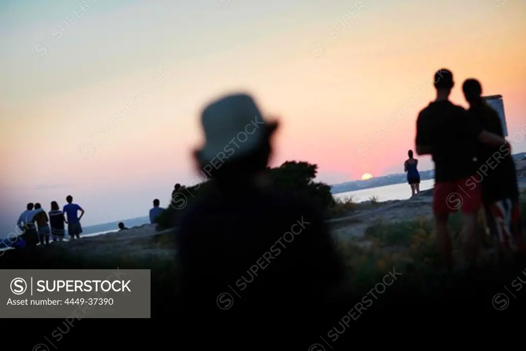 People on the beach at sunset, Pirata Bus beach bar, Formentera, Balearic Islands, Spain