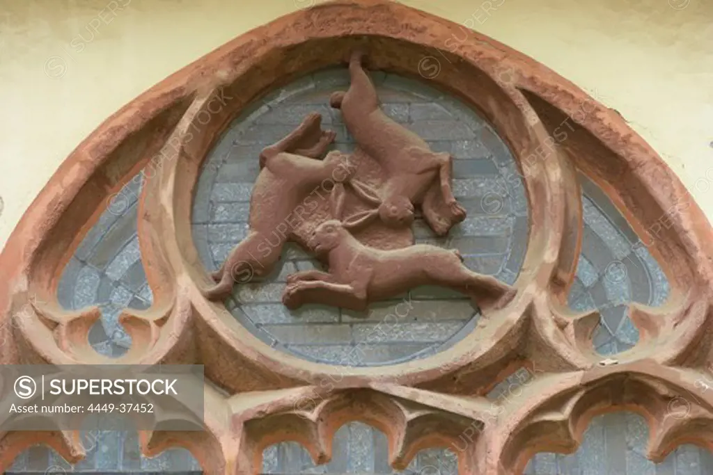 Window of three hares (Drei-Hasen-Fenster) in the cloister of the Cathedral (Dom), Strasse der Weserrenaissance, Paderborn, Teutoburger Wald, Lippe, Northrhine-Westphalia, Germany, Europe