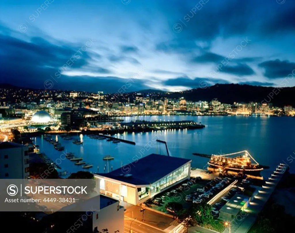 View over the illuminated Lambton Harbour with Clyde Quay Marina in the evening, Wellington, North Island, New Zealand