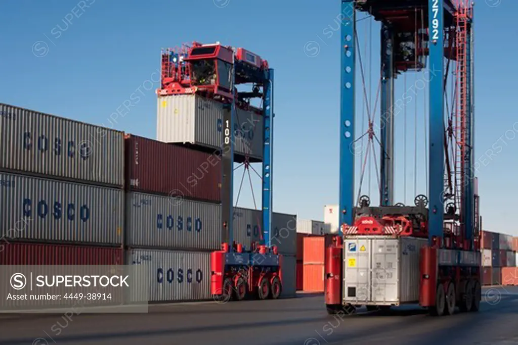 Straddle carrier with freight container, Port of Hamburg, Germany