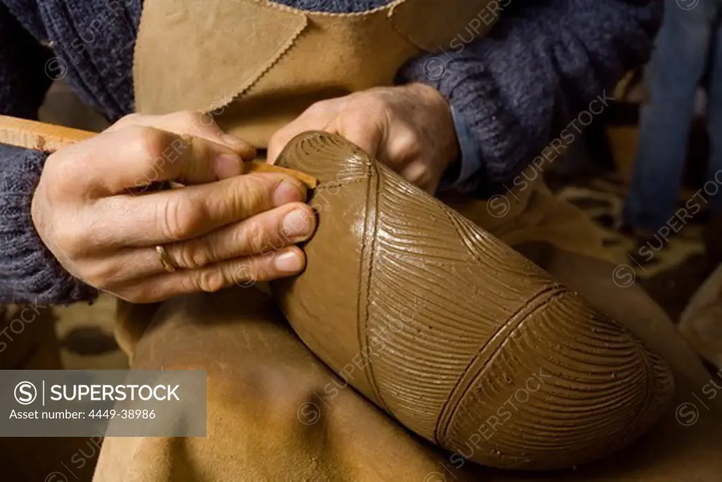 Potter engraving a bowl, ceramic, pottery, workshop, Ramon Barreto Leal, Ceramica El Molino, Hoyo de Mazo, Villa de Mazo, La Palma, Canary Islands, Spain, Europe