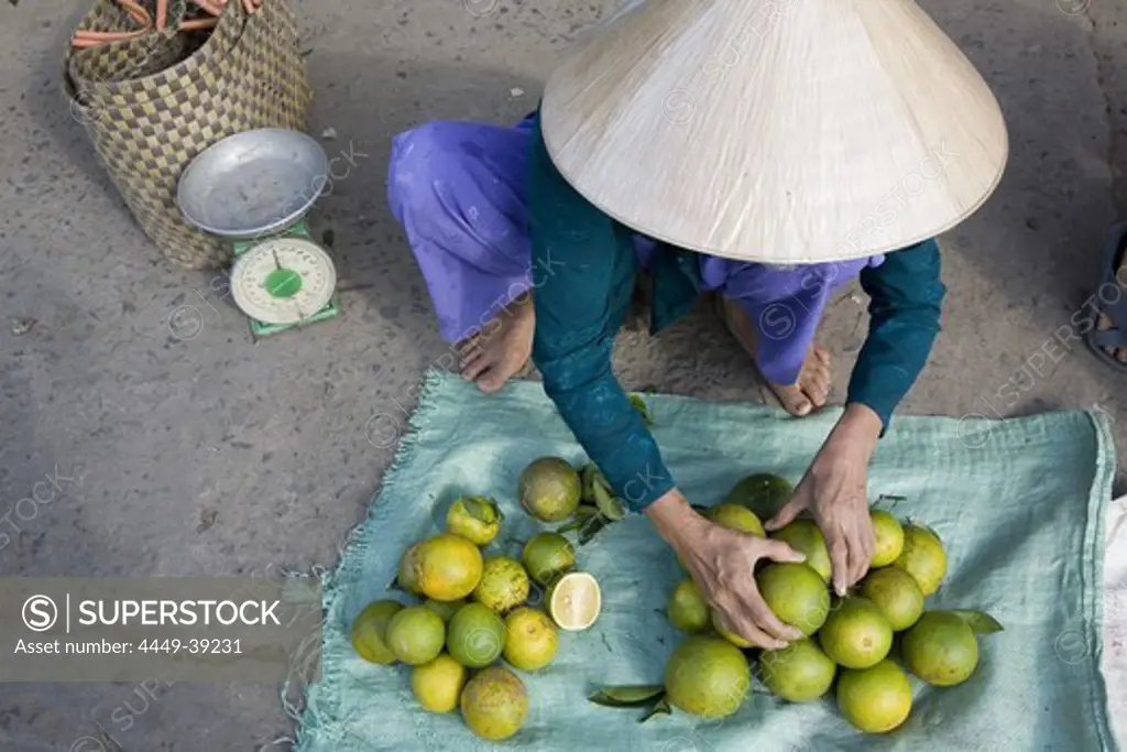 Vietnamese woman at the market at Cai Rang, Mekong Delta, Can Tho Province, Vietnam, Asia