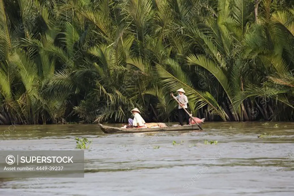 Vietnamese women on a boat on the Mekong River, Mekong Delta, Can Tho Province, Vietnam, Asia