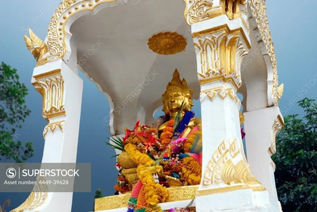 Altar with Buddha statue and traditional decoration with flowers, White Sand Beach, Hat Had Sai Khao, Koh Chang Island, National Park Mu Ko Chang, Trat, Gulf of Thailand, Thailand, Asia