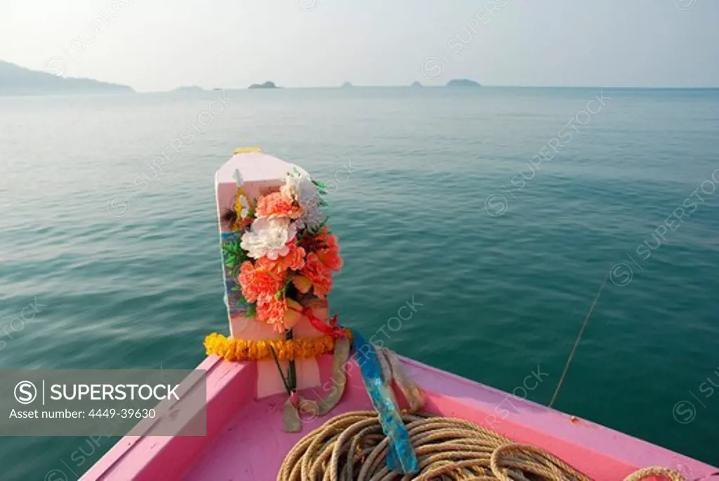 Traditional decoration with flowers on the bow of a fishing boat near Koh Chang Island, National Park Mu Ko Chang, Trat, Gulf of Thailand, Thailand, Asia