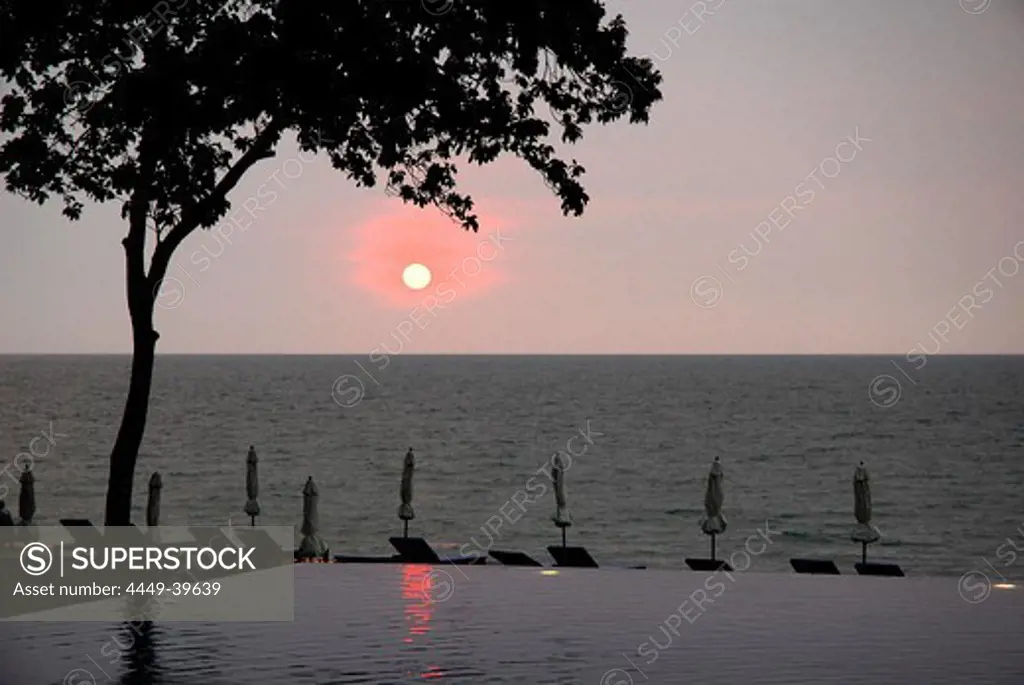 Sunset over the swimming pool of Chang Buri Resort, White Sand Beach, Hat Had Sai Khao, Koh Chang Island, National Park Mu Ko Chang, Trat, Gulf of Thailand, Thailand, Asia