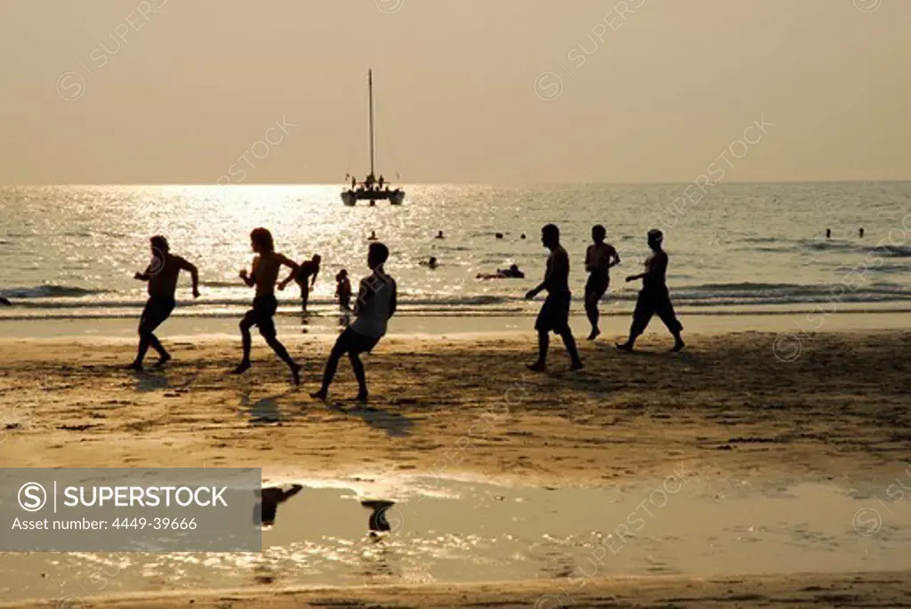 A group of men playing soccer on White Sand Beach, Hat Had Sai Khao, Koh Chang Island, National Park Mu Ko Chang, Trat, Gulf of Thailand, Thailand, Asia