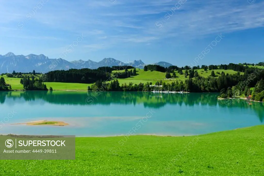 Lake Forggensee with Tannheim range in background, East Allgaeu, Bavaria, Germany