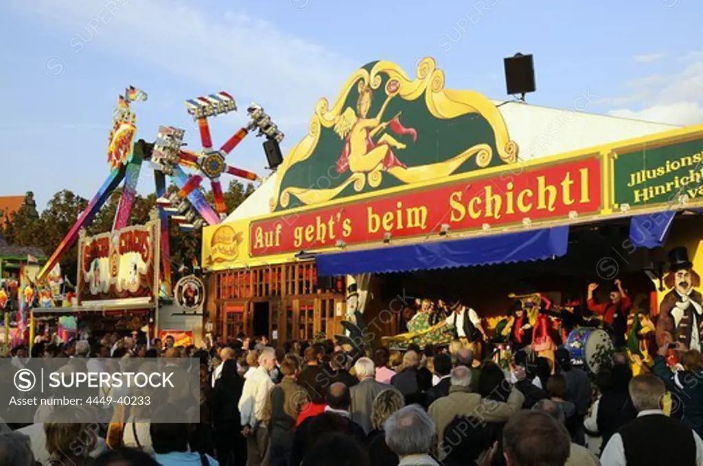 People in front of the show booth at Schichtl, Oktoberfest, Munich, Bavaria, Germany, Europe