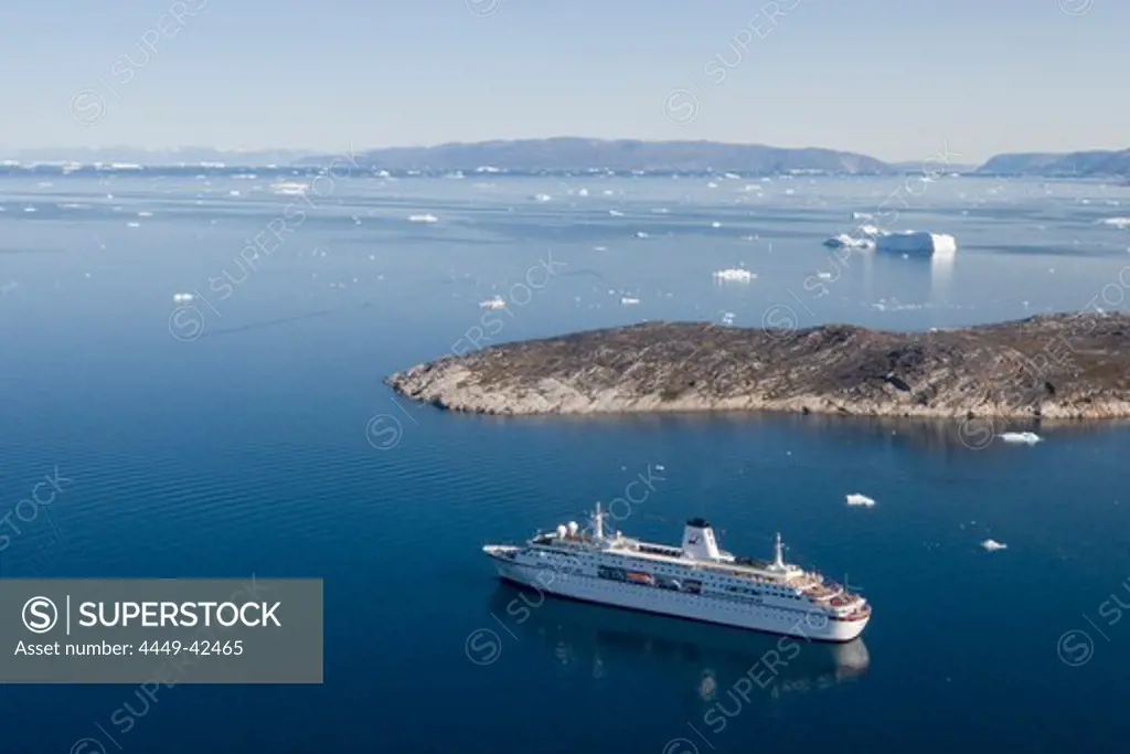 Aerial view of cruise ship MS Deutschland and icebergs, Ilulissat (Jakobshavn), Disko Bay, Kitaa, Greenland