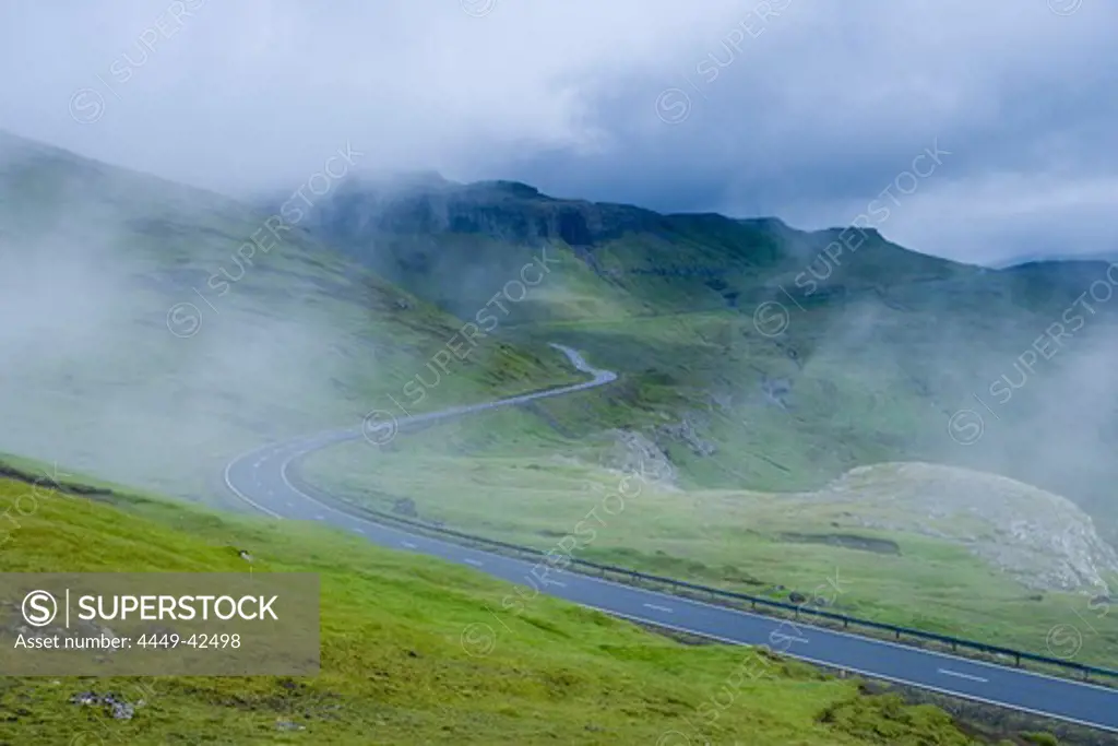 Road in the fog at highland of Streymoy Island, Faroe Islands
