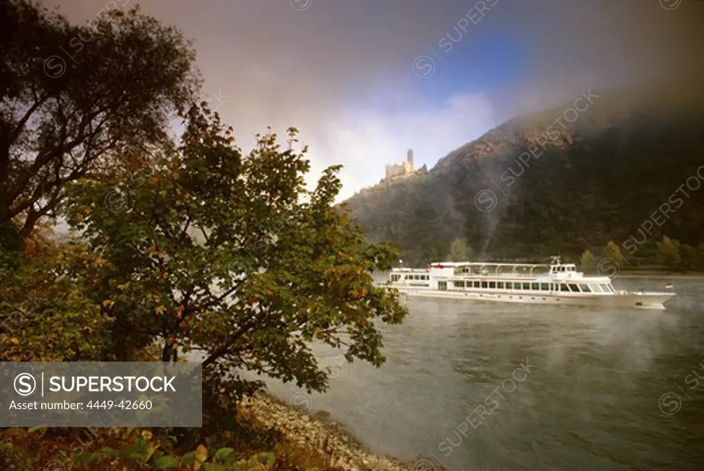 Morning mist, excursion ship at Maus castle, near St. Goarshausen, Rhine river, Rhineland-Palatinate, Germany