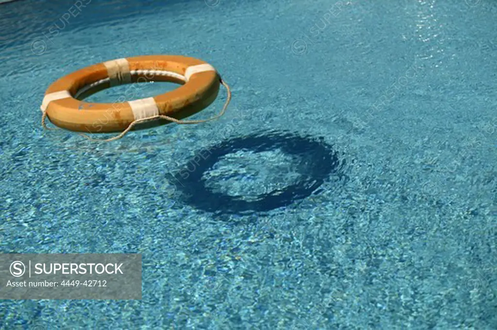 Life ring floating in a swimming pool, Safety