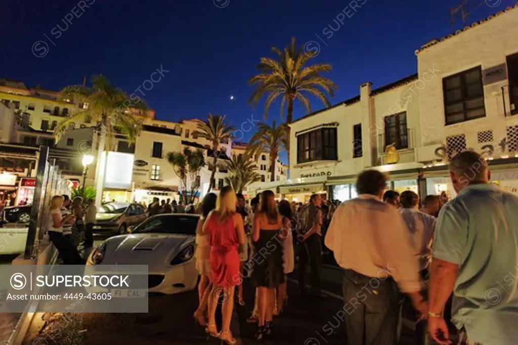 Party guests at harbour, Puerto Banus, Marbella, Andalusia, Spain