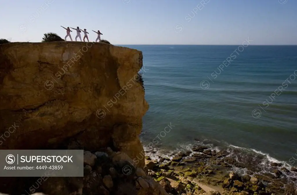 Tai Chi on cliff, Albufeira, Alagrve, Portugal