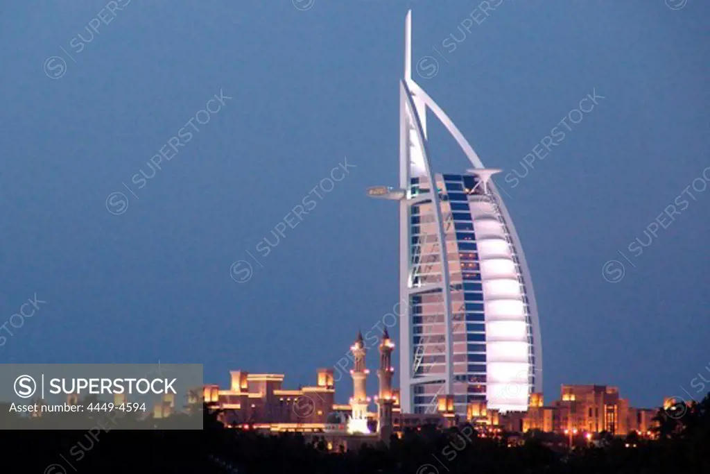The illuminated Burj al Arab hotel in the evening, Dubai, United Arab Emirates, Middle East, Asia
