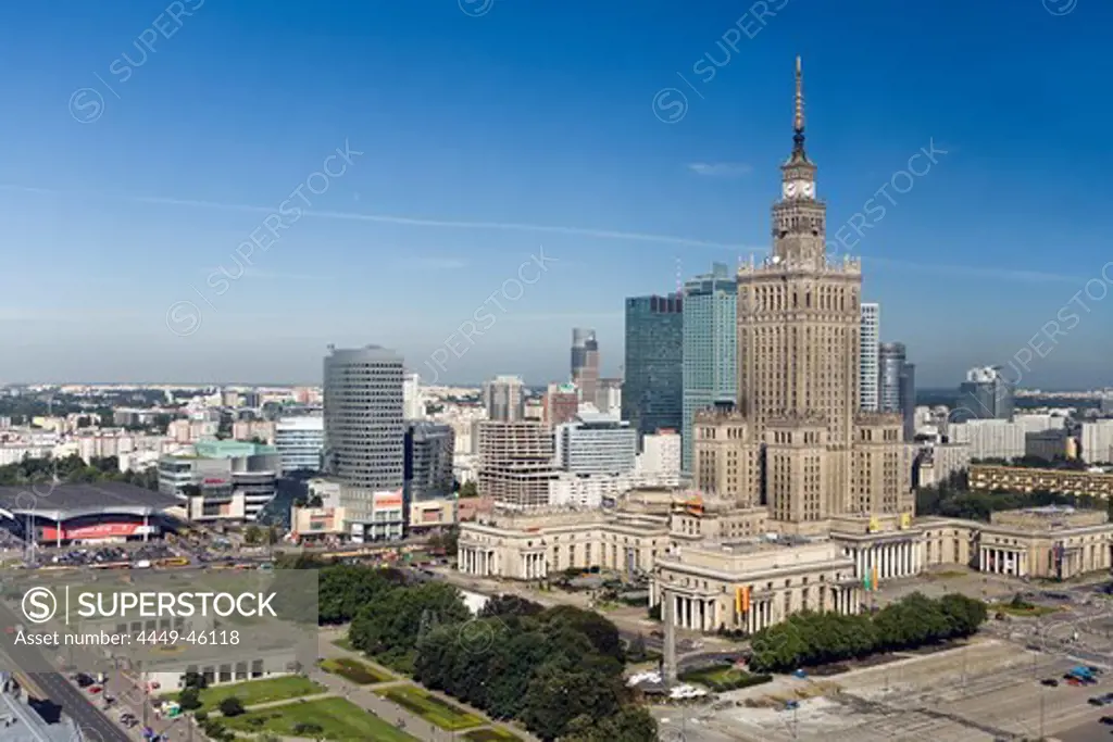 The Palace of Culture and Sciences in front of modern high rise buildings, Warsaw, Poland, Europe