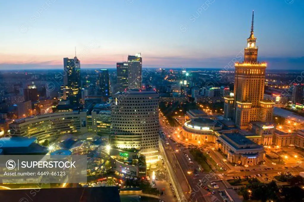 The Zlote Tarasy Shopping Complex and the Palace of Culture and Sciences in the evening, Warsaw, Poland, Europe