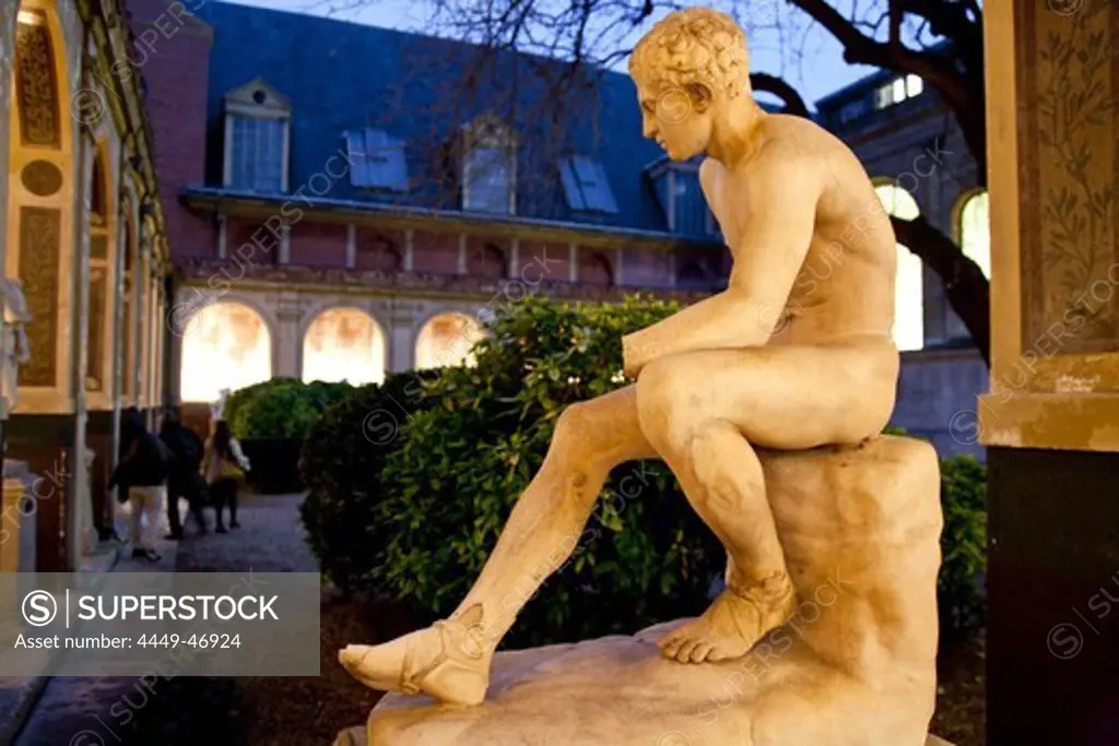 Sculpture of a young man at a courtyard in the evening, École nationale supérieure des beaux-arts de Paris, Paris, France, Europe
