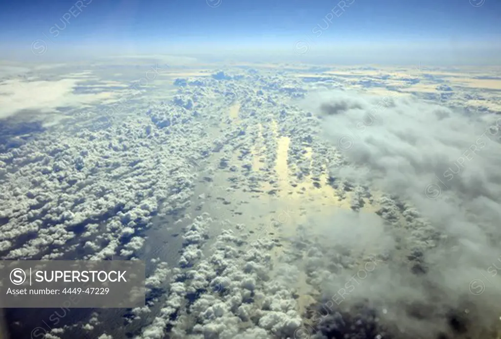 clouds over sea, view from an airplane, Spain