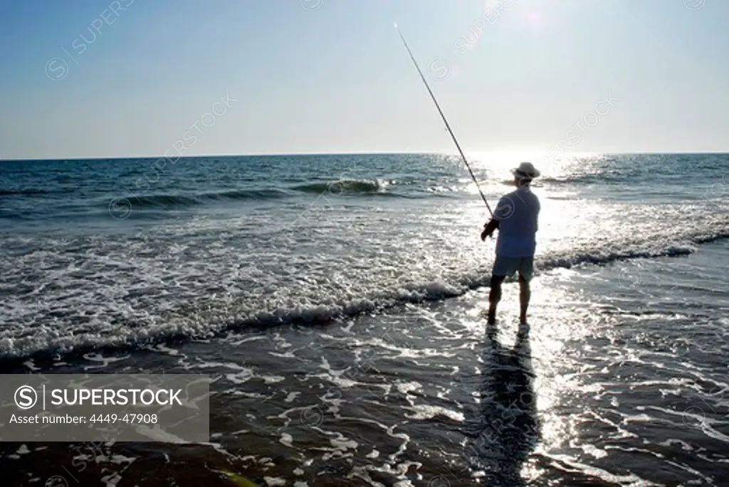 Angler, beach at the Atlantic Ocean, Playa de Punta Umbria, Costa de la Luz, Huelva, Andalusia, Andalucia, Spain, Europe