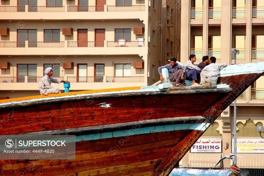 Sailors on a boat in Dubai Creek, Dubai, United Arab Emirates, UAE