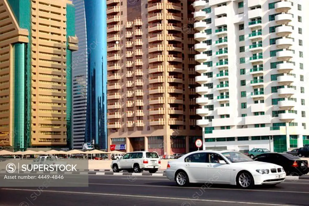 Cars on a street in front of high rise buildings, Dubai, UAE, United Arab Emirates, Middle East, Asia