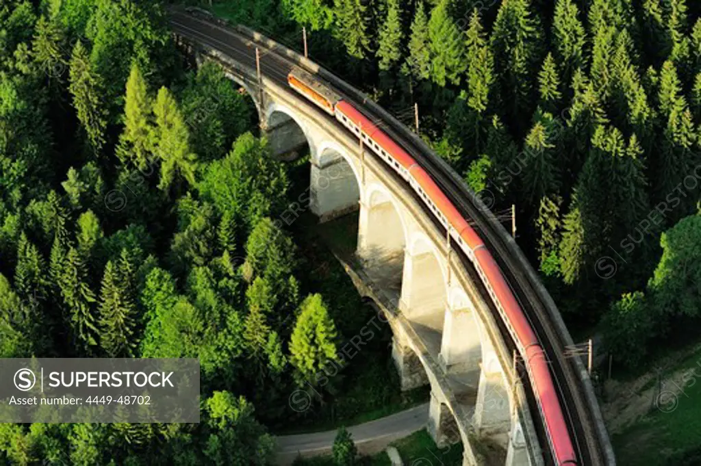 Train passing Kalte Rinn-viaduct, Semmering railway, UNESCO World Heritage Site Semmering railway, Lower Austria, Austria