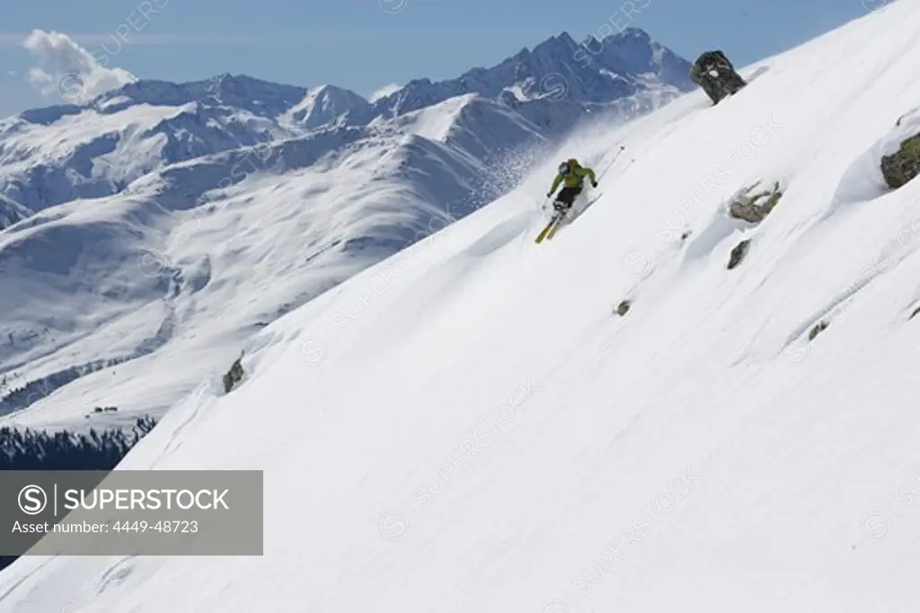 Downhill skiing in deep snow, Disentis, Oberalp pass, Canton of Grisons, Switzerland