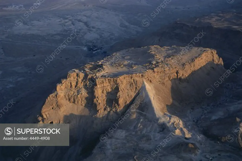 Aerial view of Masada, ancient palaces and fortifications on the top of an isolated rock plateau, Israel