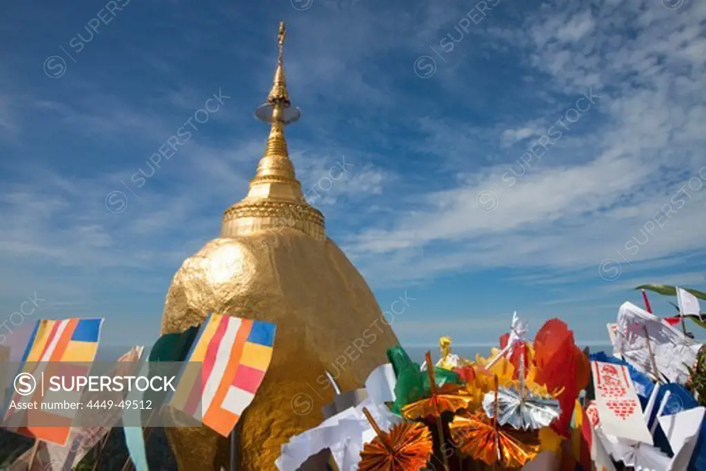 The Golden Rock with flags, Buddhistic pilgrim destination Kyaikhtiyo Pagoda, Mon State, Myanmar, Birma, Asia