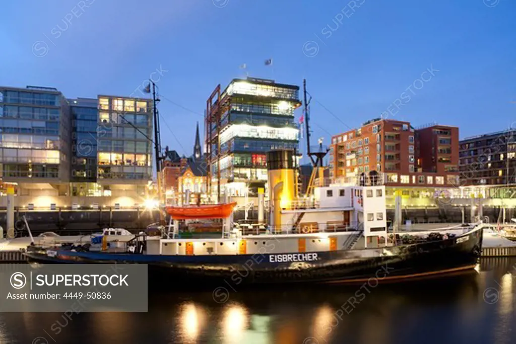 View towards boat and buildings at Sandtorkai in the evening, Sandtorhafen, harbour city, Hanseatic city of Hamburg, Germany, Europe