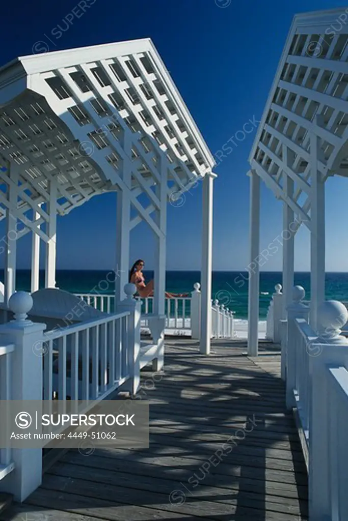 Young woman sunbathing on a veranda, Panama City Beach, Santa Rosa Island, Florida, USA, America