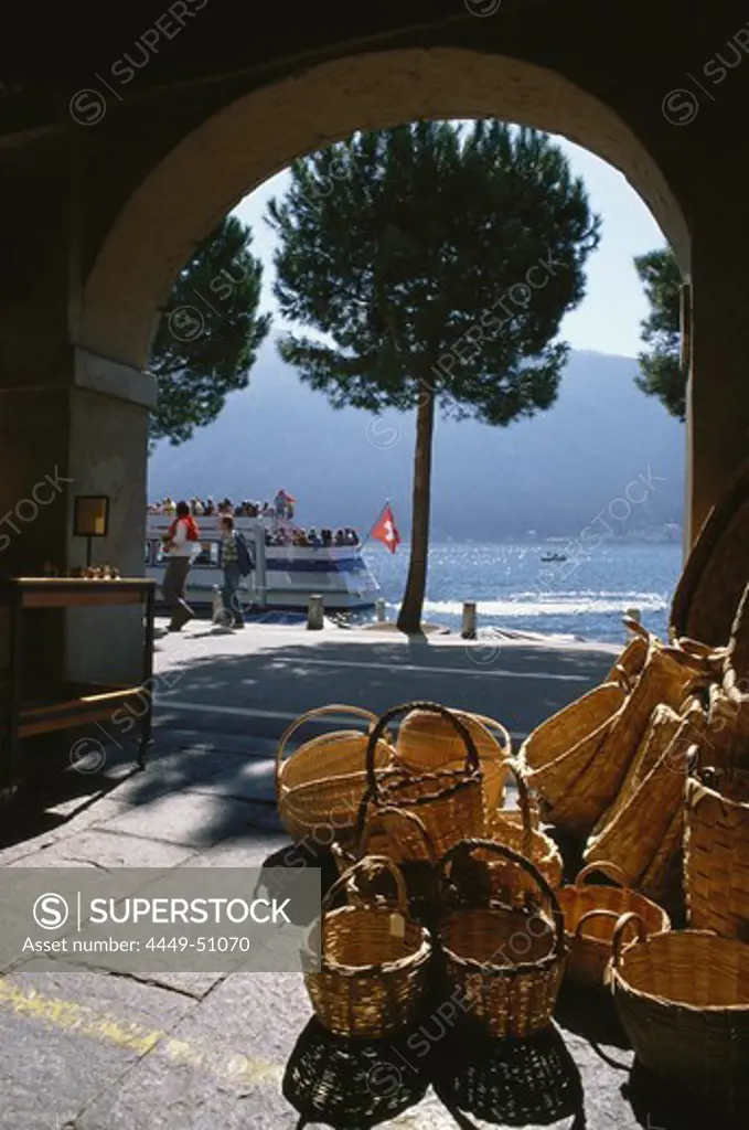 View through an archway towards Lake Lugano, Morcote, Ticino, Switzerland