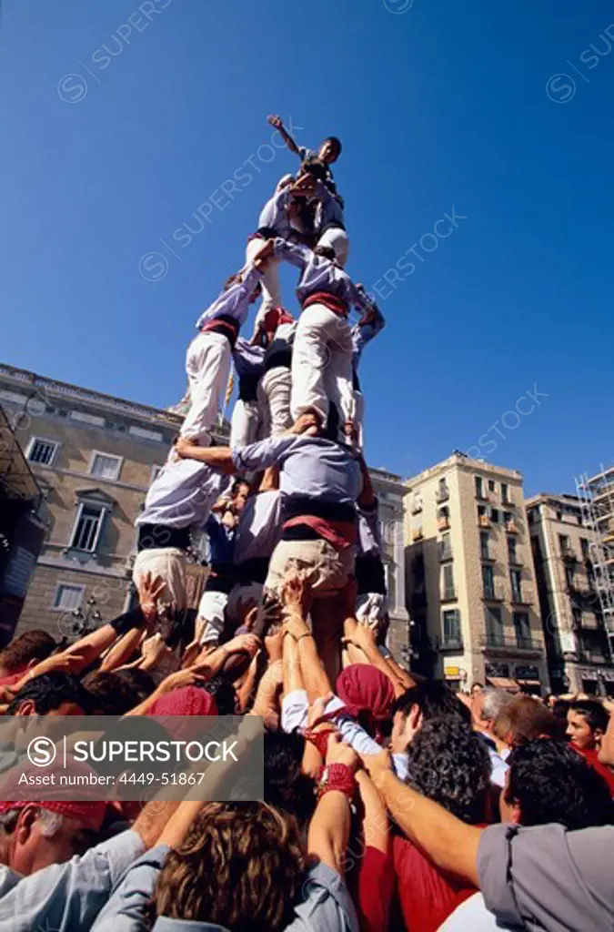 Castellers, human tower at the Festa de la Merce, Placa St. Jaume, Barcelona, Catalonia, Spain