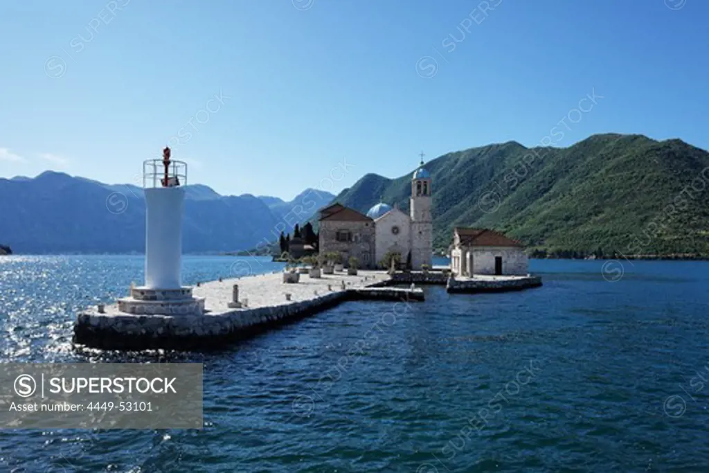 Church on the Island of Gospa od Skrpjela in the sunlight, Perast, Bay of Kotor, Montenegro, Europe