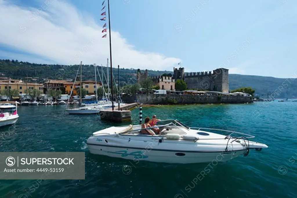 Couple in Boat, Harbor, Scaliger Castle, Torri del Benaco, Lake Garda, Veneto, Italy