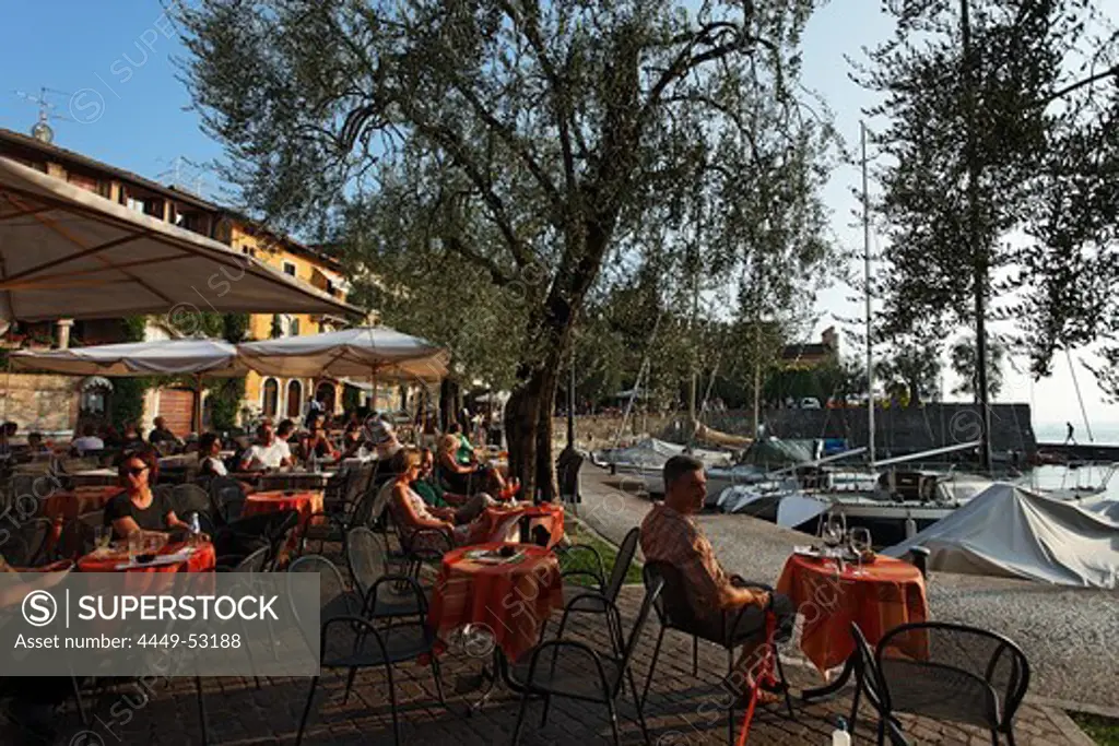 People sitting outside, Cafe, Torri del Benaco, Lake Garda, Veneto, Italy