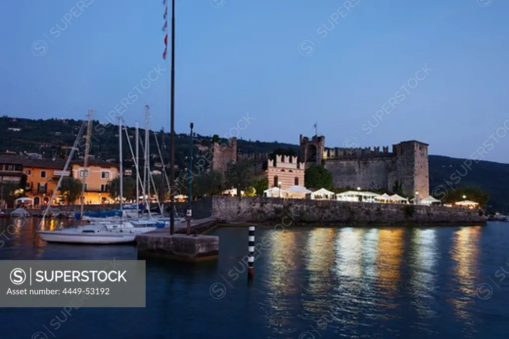 Evening mood, boats at Harbor, Scaliger Castle, Torri del Benaco, Lake Garda, Veneto, Italy
