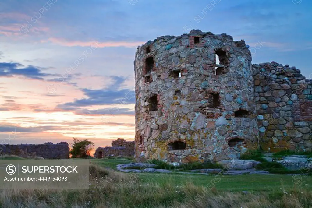 Afterglow over the ruins of the castle Hammershus, Bornholm, Denmark, Europe