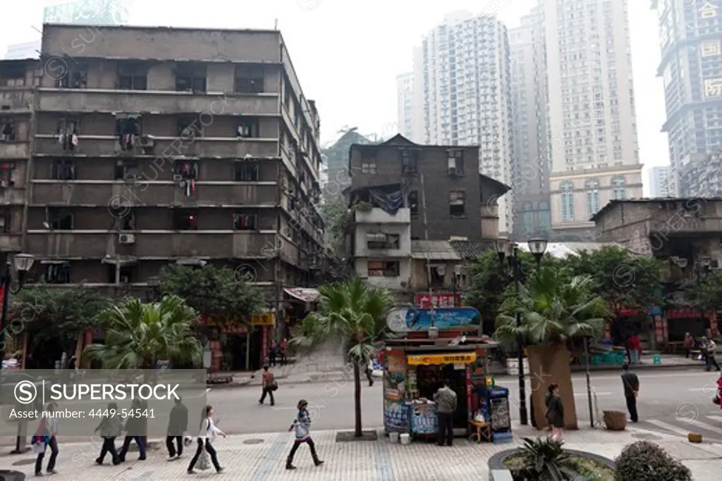 Street in Chongqing, skyscrape and run-down buildings, kiosk, Chongqing, People's Republic of China