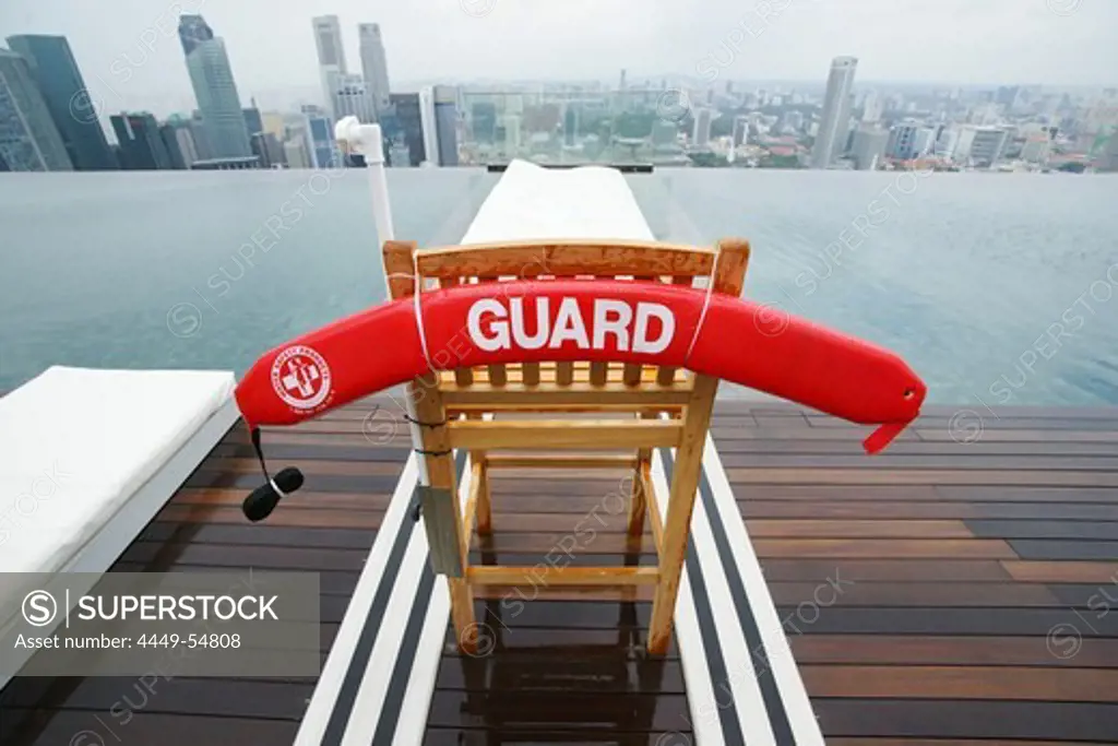 Lifeguard at Sands SkyPark infinity pool, Marina Bay Sands Hotel, Singapore, Asia