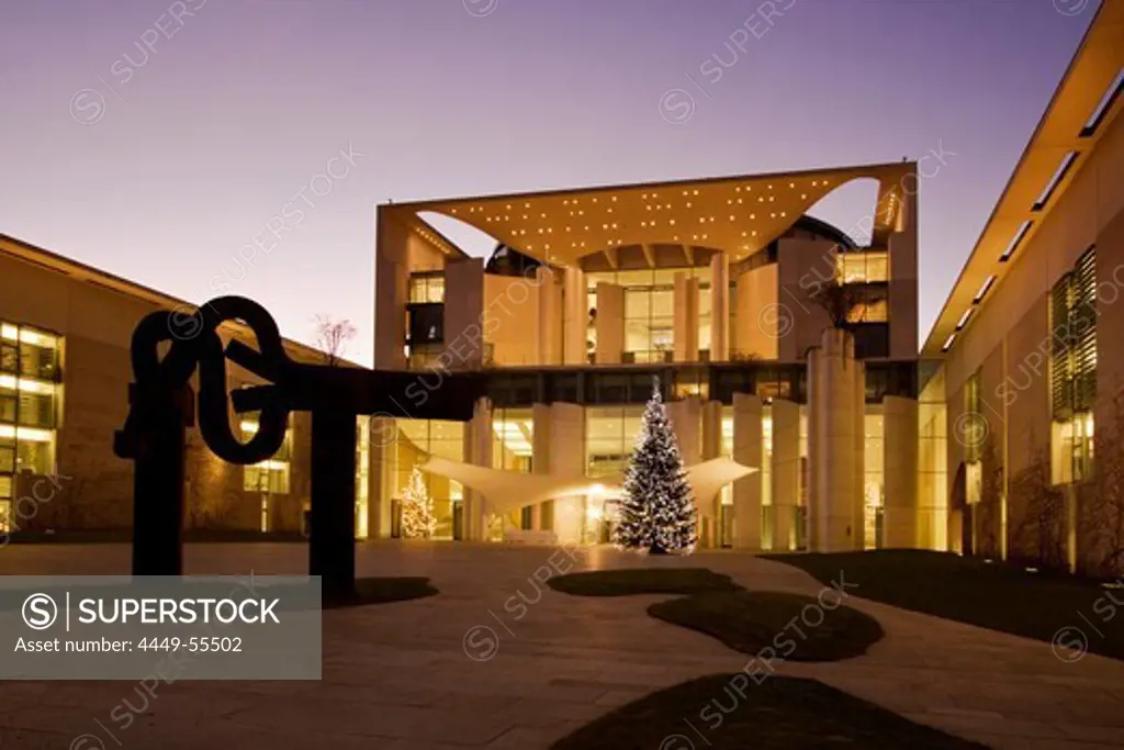 Chancellor office with Christmas treeat twilight, architect Axel Schultes, sculpture by Eduardo Chillida, Berlin, Germany