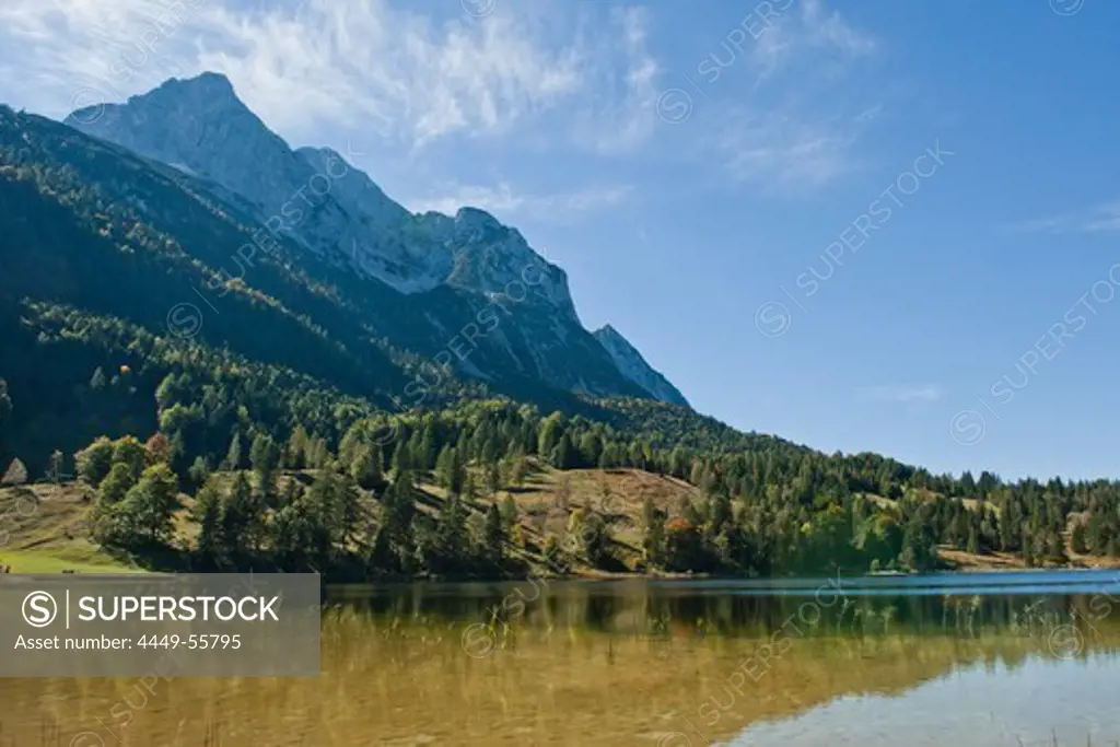 View over lake Lautersee to mountain range, Mittenwald, Bavaria, Germany